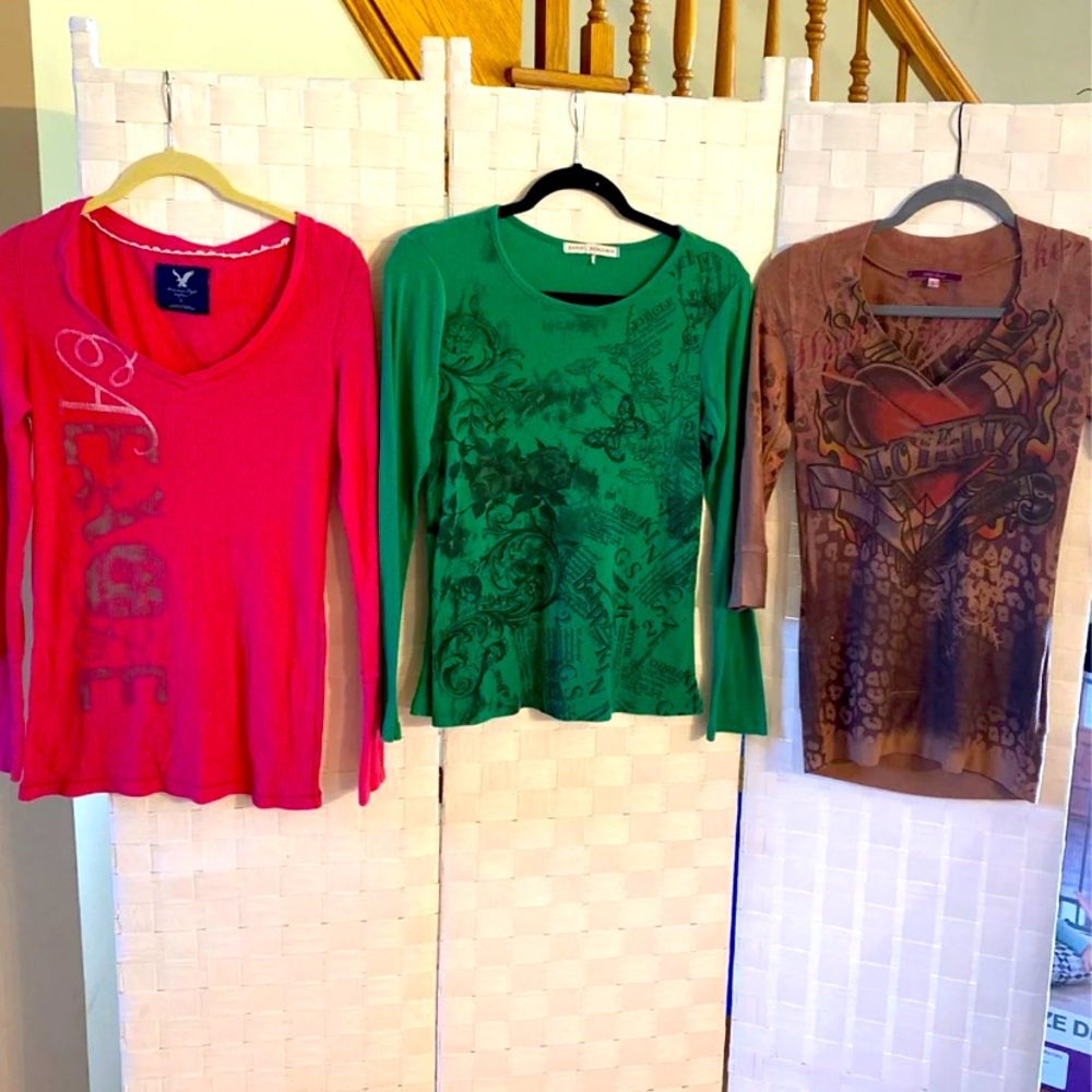 Three long sleeve size large shirts